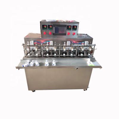 China Automatic Thermoforming Beverage Bag 8 Head Filling Mango Juice Packing Machine For Yogurt for sale