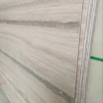 China Modern Ocean Blue Travertine Lightly Panels Veneer Translucent Marble For Wall Background Design for sale