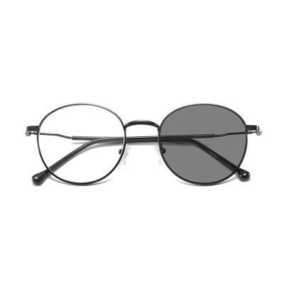 China Fashionable Round Designer Anti Radiation Photochromic Frames Glasses For Women Mens for sale