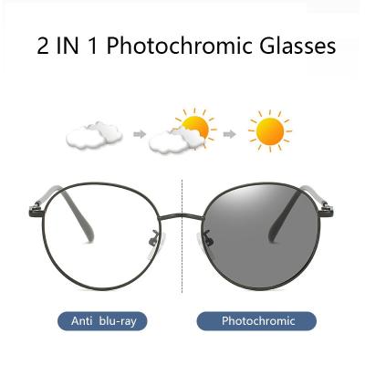 China Fashionable Blue Anti Block Photochromic Glasses For Women Men Oval Frame Metal Computer Eyewear for sale