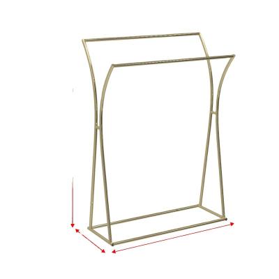 China Environmentally Friendly Stainless Steel Hanging Clothes Rack Women's Clothing Rack Gold Floor-standing Display Shelf crushed diamond shelves for sale