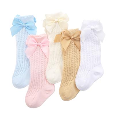 China Custom Logo Bowknot Breathable Cotton 0-3 Years Old Girl Newborn Big Bow Knee Soft Toddler Socks Long Tops Booties Babies Socks for sale