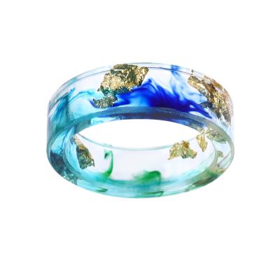 China Flower Scenery Clear Clear Clear Ocean Religious Resin Religious Dry Epoxy Handmade Rings For Women Men for sale