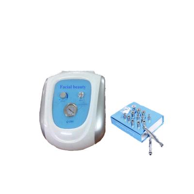 China Exfoliators CE Approval Death Skin Peeling Equipment QD01 12 Tips Microdermabrasion Skin Peeling Beauty Machine for sale