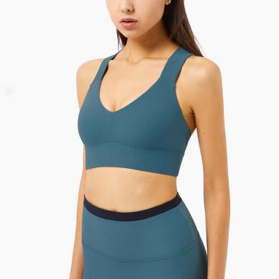 China New Cross-Back Yoga Quick-drying Female Fitness Vest Breathable Solid Running Workout Ribbed Sports Bras Cultivate Top Fitness Women for sale