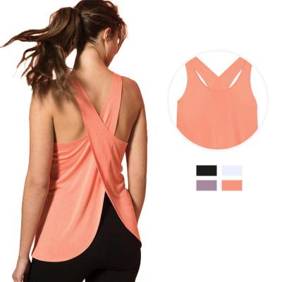 China 2021 Women's Beauty QUICK DRY Cross Back Fitness Vest Sleeveless Loose Breathable Fashion Yoga Working Yoga Custom Tank Top for sale