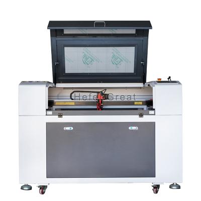 China Factory Price 9060 Air Cooled CO2 Laser Engraving And Cutting Machine For Nonmetal for sale