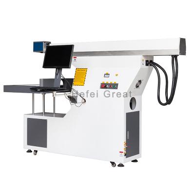 China Automated Laser Marking Machine Raycus Source Loading Marker For Metal Plastic 20w 30w 50w 100w for sale