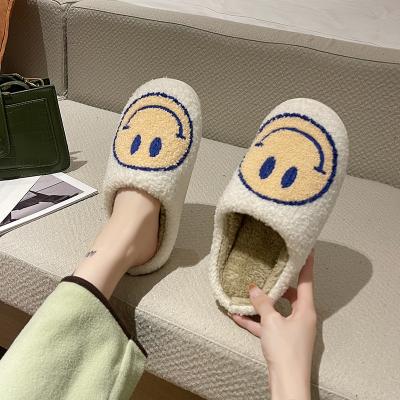 China 2021 Fashion Trend New Unisex Soft Plush Slippers Unique Winter Slip On Warm Comfortable Smiley Face Indoor Slippers for sale