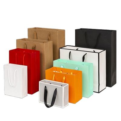 China High Quality Recycled Materials China Factory Manufacture Design Colorful Custom Printed Luxury Paper Gift Bags With Logos for sale