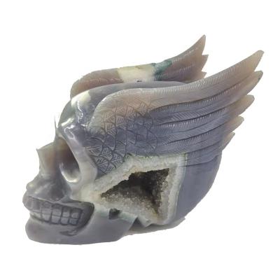 China China XingChen Wholesale Natural Gems Hand Carved Crystal Skull Cave Agate High Quality Winged Skull With Wing For Home Decoration for sale