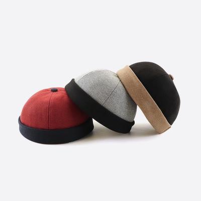 China New Product JOINT Vintage Felt Hat Two Tone Color Cuff Skull Brimless Rolled Cap For Women And Men Docker Hat for sale