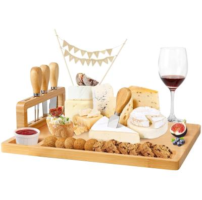 China Sustainable Bamboo Cheese Board Set Serving Tray Wooden Cutting Board And Knife Set With Cutlery Holder for sale