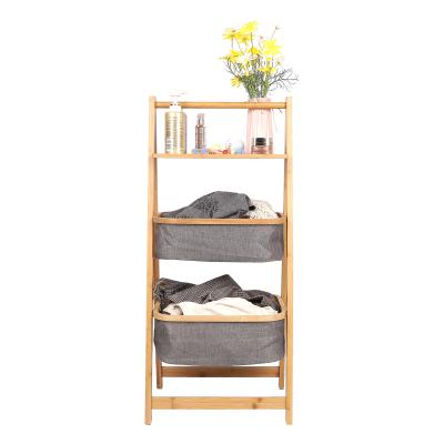 China Standing Type Foldable Home Clothes Storage Rack Bamboo Wooden Shelf With Basket Compartment Laundry Basket for sale