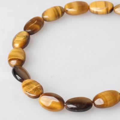 China Polished Soft Gemstone Tiger Eye Oval Beads Strand For Jewelry Making for sale