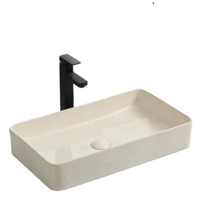 China 9396-998 Yingjie Modern Unique Design Above Counter Toilet Bowl Wash Basin Marble Sink Basin Living Room Ceramic Art Basin For Bathroom for sale