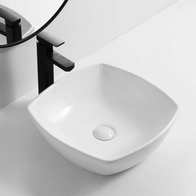 China Modern High Quality White Bathroom Sink Set Vanity Hand Wash Ceramic Countertops Art Basin For Hotel for sale