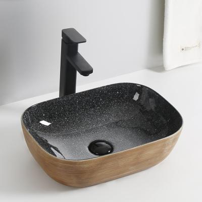 China Marble Worktop Modern Art Bathroom Sink Basin Ceramic Hand Wash Surface CE Sink for sale