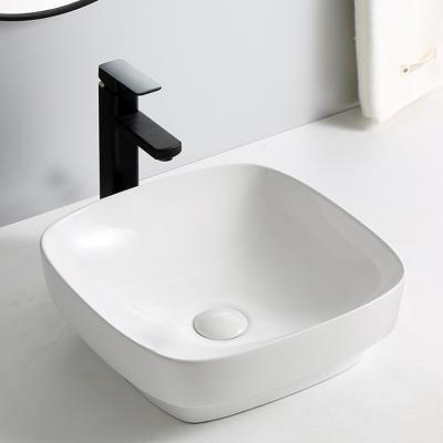 China 9569 CE CUPC Hot Ceramic Bathroom Sink Art Hand Countertops Rustic White Style Vanity Sink For 4 Star Hotel for sale