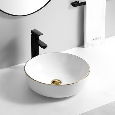 China Minimalist Modern Fashion Style Round Vanity Bathroom Sink Basin with Gold Edge in Matte White for sale