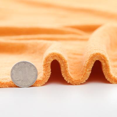 China Chinese Double Side Blanket QUICK DRY Coral Fleece Fabric Bath Towel Flannel for sale