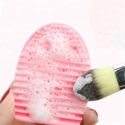 China Silicone Brush Cleaning Mat Wash Egg Brush Cleaner Silicone Make Up Brush Cleaner for sale