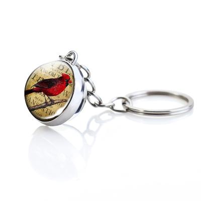 China Red Bird Cardinal Key Chain Cute Animals Metal Double Glass Ball Side Pendant Key Ring For Women for sale