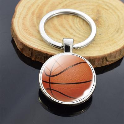 China Metal Basketball Key Chain Double Sided Glass Ornaments Soccer Tennis Volleyball Billiards Golf Baseball Roll Pendant Souvenirs for sale