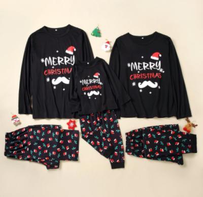 China 2021 hot sale lovely QUICK DRY floral Christmas family printed matching pajamas letters pants sets Christmas pajamas for sale