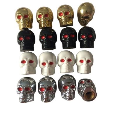 China Automotive Valve ABS Tire Shape Skull Personality Parts Plastic Tire Valve Cover for sale