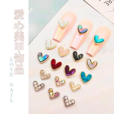 China Alloy Love Fritillaria Nail Accessories Metal Package Edge 3 D Nail Stick Hearts Nail Drill for sale