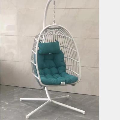 China Modern Rattan Folding Balcony Garden Swing Egg Chair Wicker Hanging Hanging Chair With Metal Stand for sale