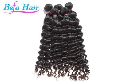 China Tramas rizadas/flojas malasias de las extensiones del pelo de la Virgen del grado 7A de la onda en venta