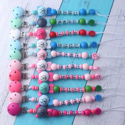 China Silicone Free Wooden Bead BPA Baby Pacifier Chain Love Mother Love Baby Pacifier Chain for sale