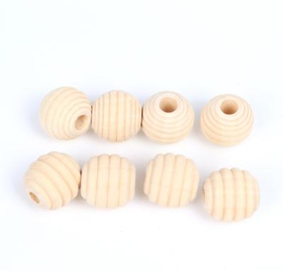 China DIY necklace//bracelets/bracelets/unfinished beehive wooden round pendant unfinished beads for DIY teething necklace unvarnish original honeycomb beads for sale