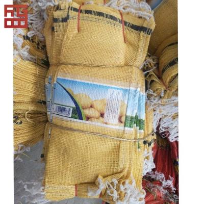 China PP Woven Vegetables Packing Onion Potatoes Garlic garbage mesh bags for sale