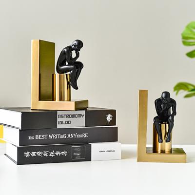 China Decorative Art Thinker Sitting Man Bookends Contemporary American Style Table Top Resin Abstract Figurine for sale