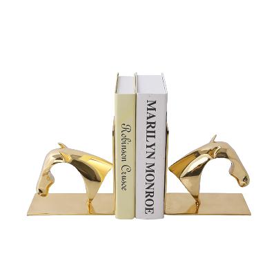 China Contemporary Modern Brass Horse Shaped Bookends Abstract Carving Animal Book Ends For Home Decorative for sale