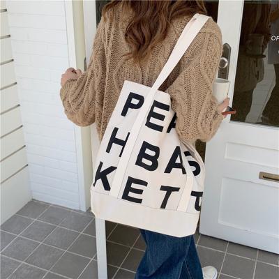 China Folding High Quality Reusable Women Fashion Cotton Canvas Shopping Bag Custom Logo for sale