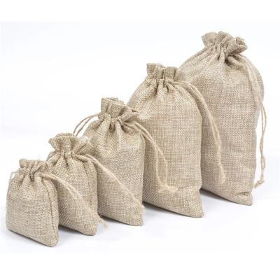 China Custom Soft Beige Folding Logo Embroidery Jute Hessian Burlap Gift Drawstring Bag Jute Coffee Tea Packaging Bag for sale