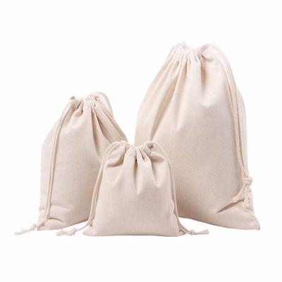 China Small Folding Pouch Durable White Recycle Gift Packaging Cotton Drawstring Bag With Logo for sale