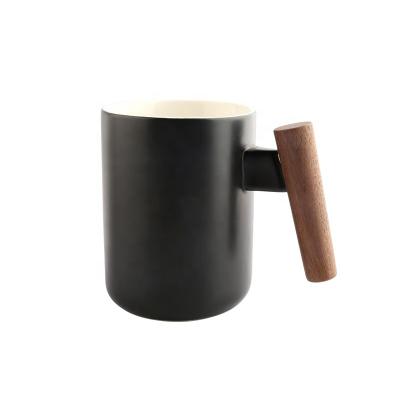 China 12oz Sublimation Good Quality New Arrival Custom Made Logo Coffee Ceramic Mug With Wood Handle for sale