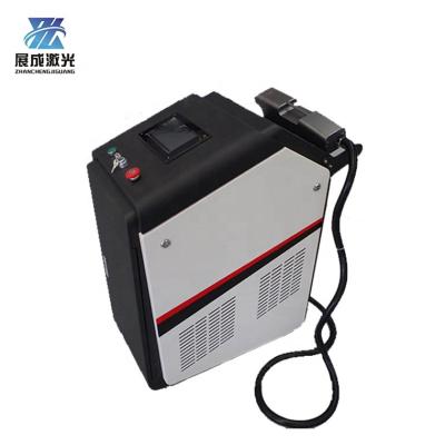 China Exterior paint cleaning Q-switched fiber laser cleaning machine for precision metal parts without hurting the body for sale