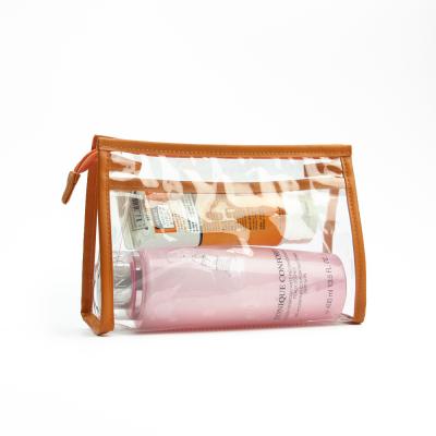 China New Fashion Travel Clear Plastic Transparent Makeup Toiletry Zipper Bag PVC Cosmetic Makeup Bag for sale