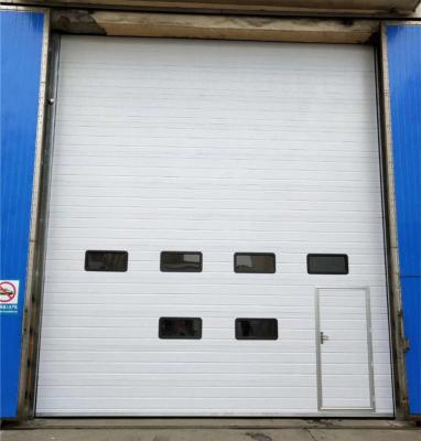 China Modern high quality automatic lifting industrial overhead sectional door for warehouse for sale