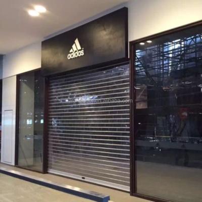 China Transparent Rolling Shutter Automatic Crystal Door Shutter Door for sale