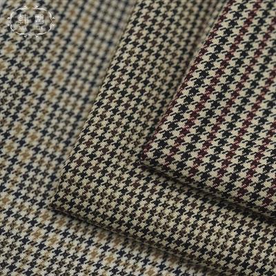 China Worsted viable 415g houndstooth wool blend fabric men and women spring and fall suit fashion woolen fabric for sale