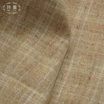 China Spring and Autumn Camel Flannel Color Point Spot Wool Fabric Plaid Viable Plain Weave Wool Fabric for sale