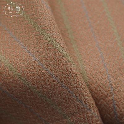 China SIZE SIZE Orange Spot Herringbone Semi Worsted Wool Blended Fabric, Mens and Womens Spring and Fall Suits Suit for sale