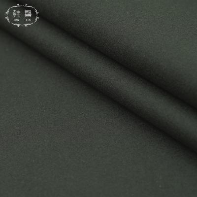 China 650g pure thick thick winter autumn paragraph color fabric 650g Melton wool coat fabric 650g raw army green spot wheat spinning fabric for sale